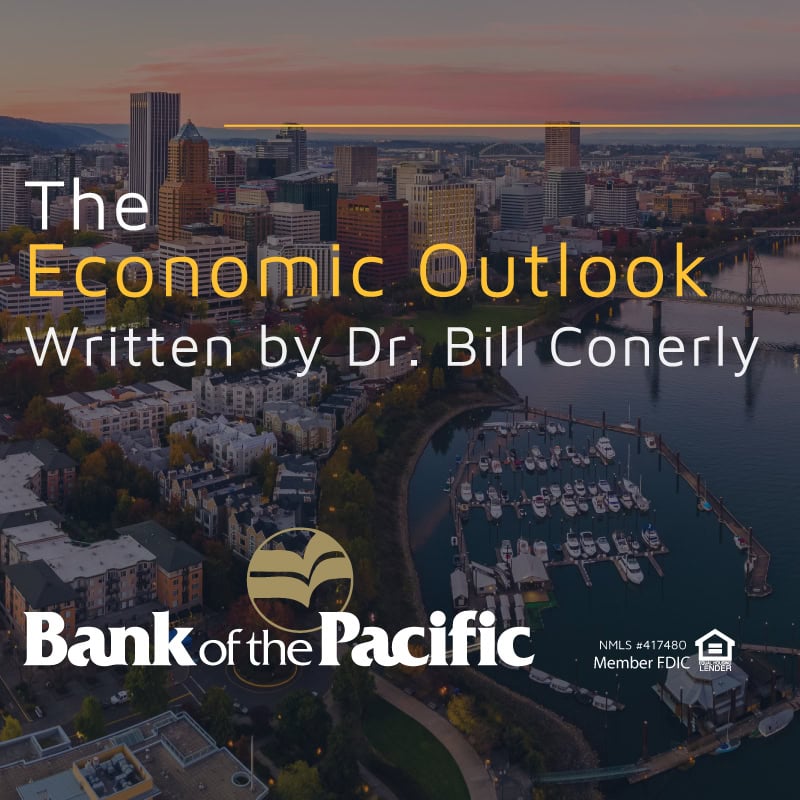 Economic outlook report cover featuring Portland skyline and river at sunset.